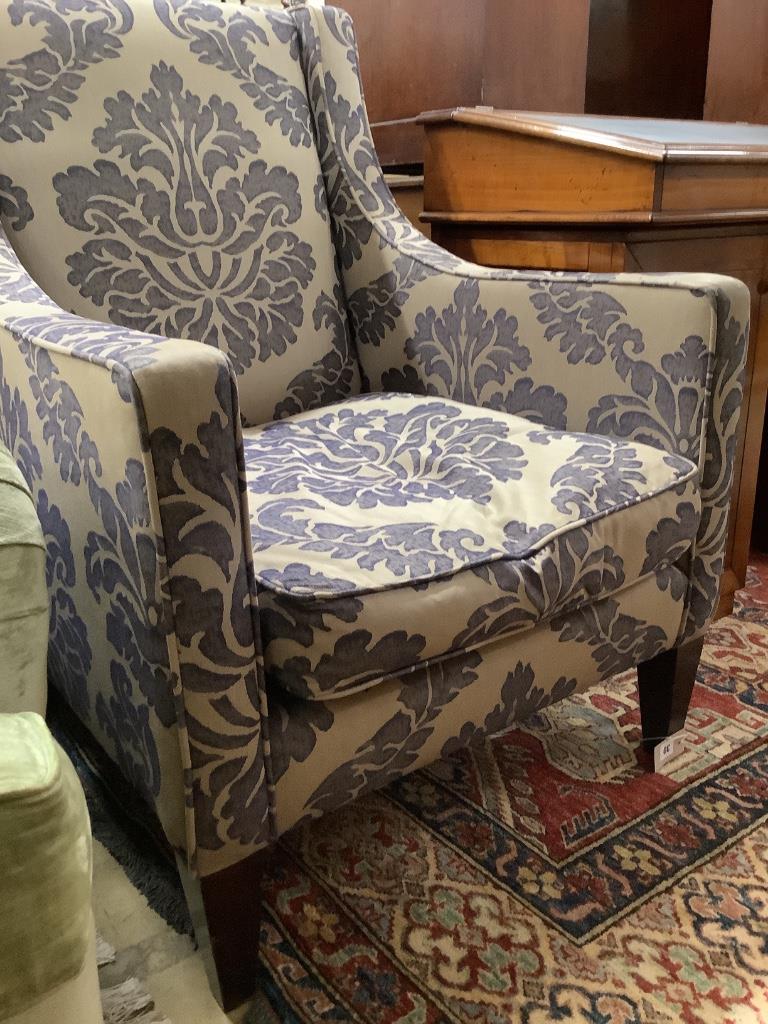 A contemporary armchair with silver/ blue patterned fabric, bought from the George Smith London store, width 74cm, depth 76cm, height 100cm
